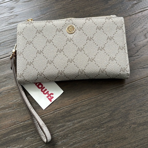 Anne Klein Accessories - Ann Klein Wallet/wristlet,2 zippered coin areas,7 card slots.snap section
